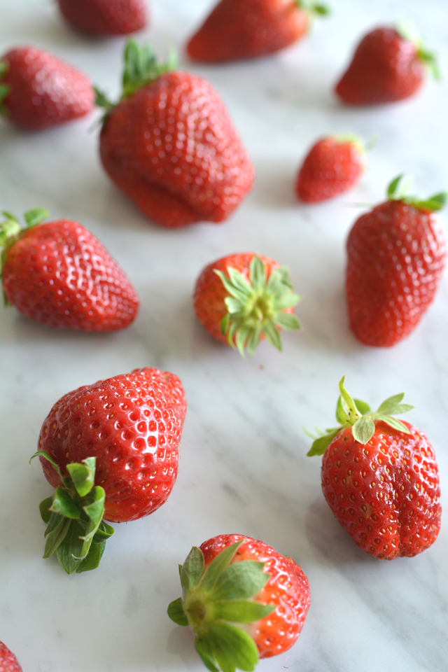 overhead view of a vibrant assortment of freshly picked strawberries