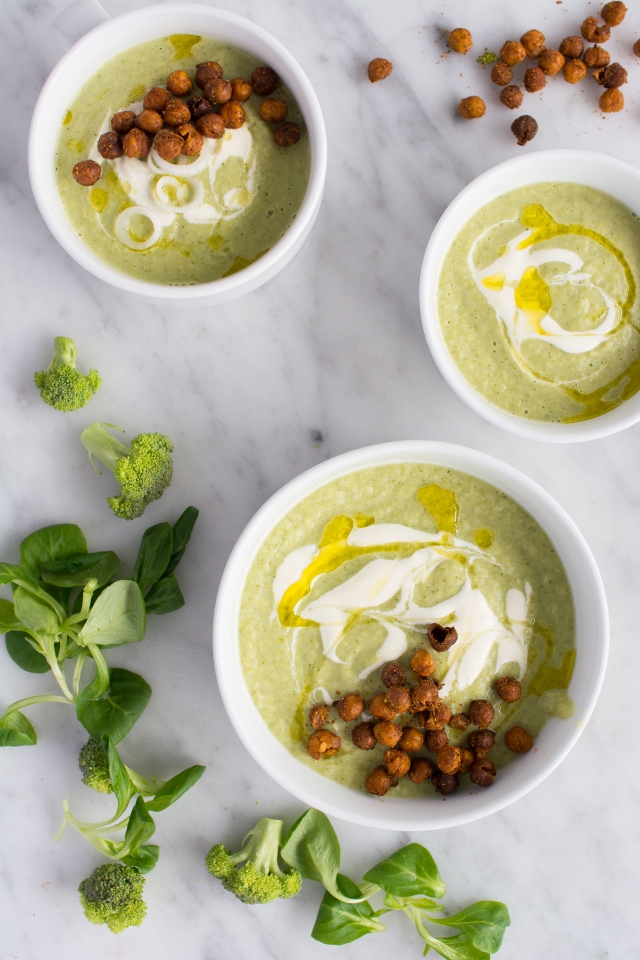 top view image of 3 bowls of broccoli and quinoa soup topped with spicy roasted chickpeas 