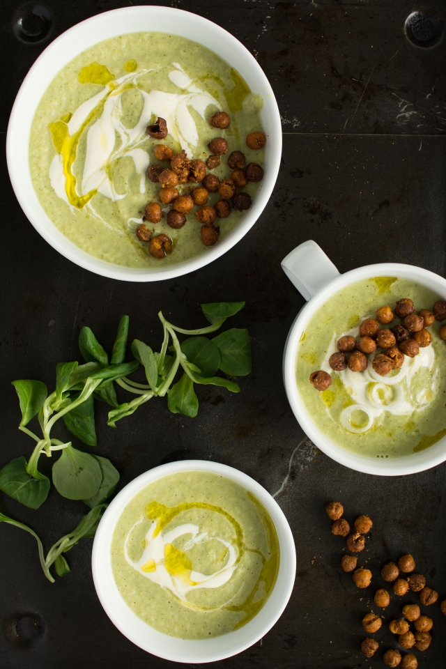 yop view image of 3 bowls of broccoli and quinoa soup topped with roasted chickpeas