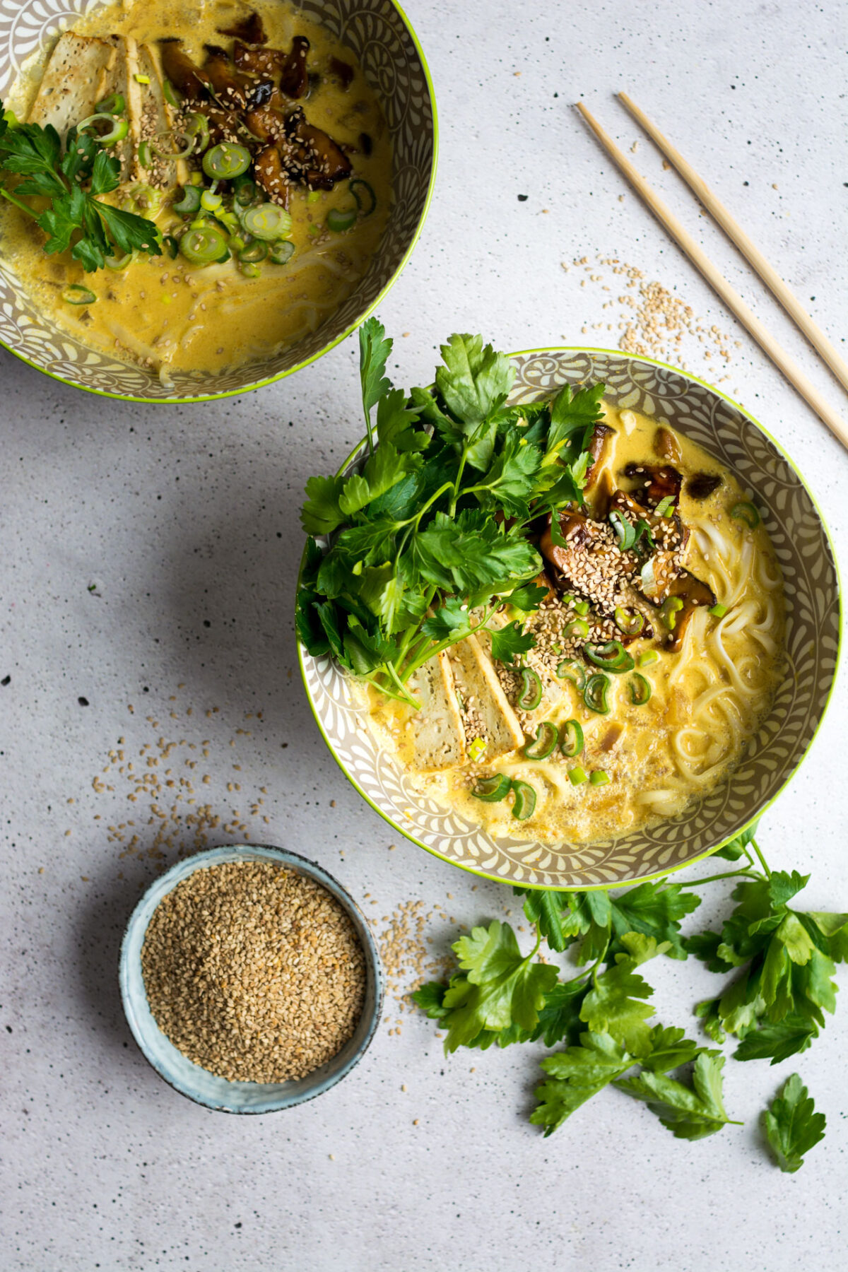 A rich, vegan, coconut curry ramen bowl, with marinated mushrooms and crispy tofu!