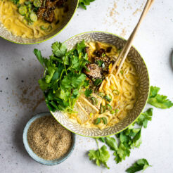 A rich, vegan, coconut curry ramen bowl, with marinated mushrooms and crispy tofu!