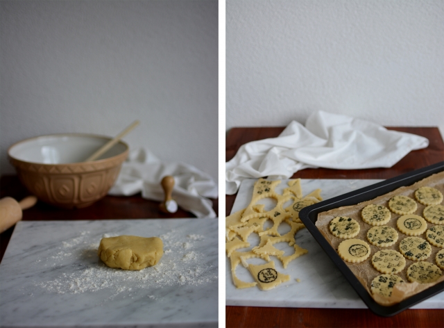 an image collage featuring two pictures: on the left, a scoop of cookie dough being flattened, and on the right, a baking tray filled with cut cookie dough, each piece stamped with intricate designs. an extra piece of cut dough is placed next to the tray.
