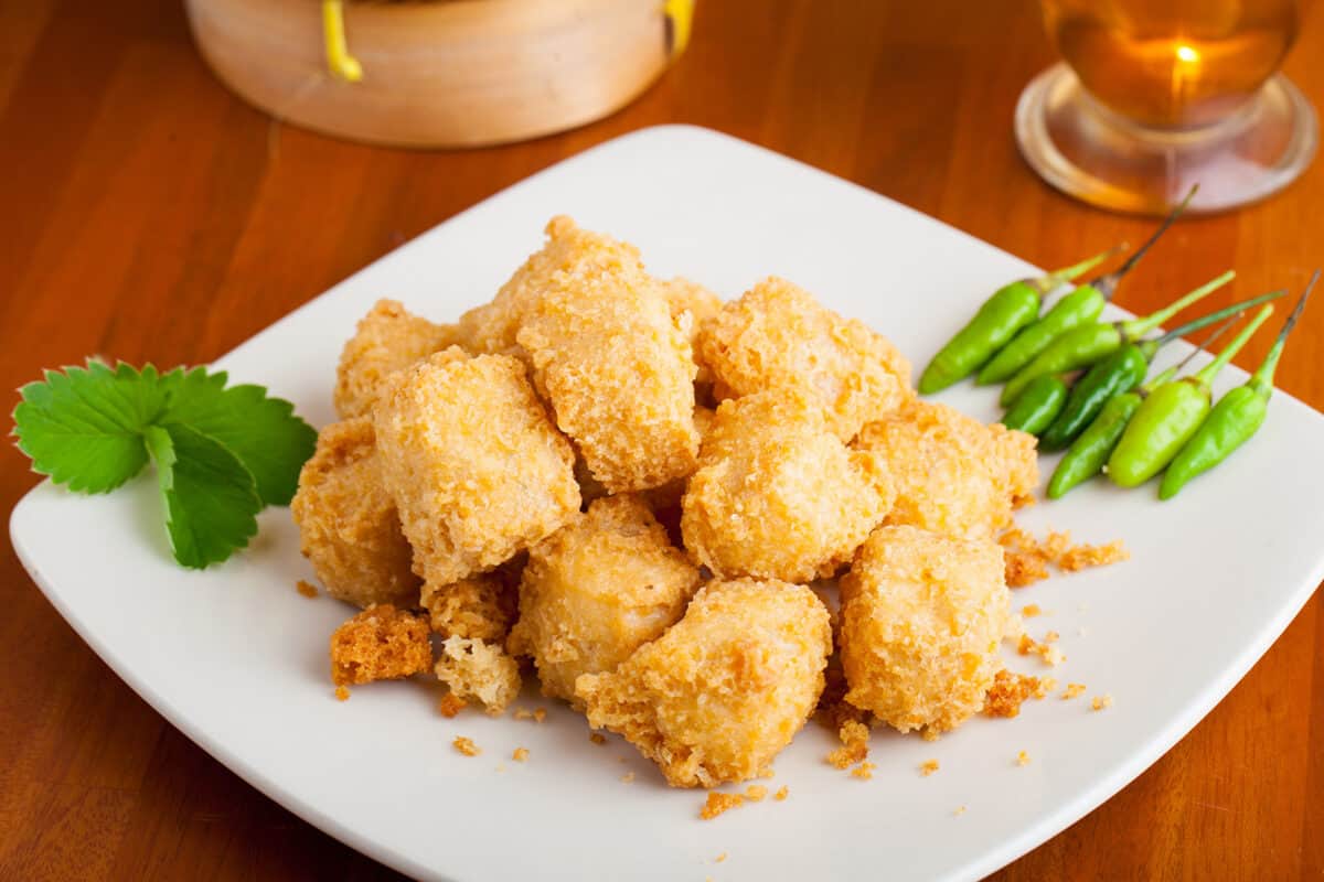 A plate of crispy, fried tofu.