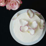 cropped image of the raspberry rose cake top with rose petals