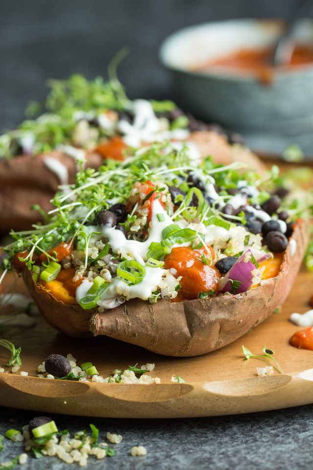 Loaded Sweet Potatoes with Quinoa Tabbouleh. Healthy and totally vegan, these baked sweet potatoes are topped with fresh, vibrant ingredients for a great, satisfying meal!