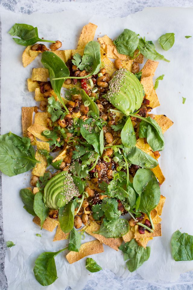 Loaded Vegan Nachos with Harissa Beans, the perfect easy snack for a hot summer's day!