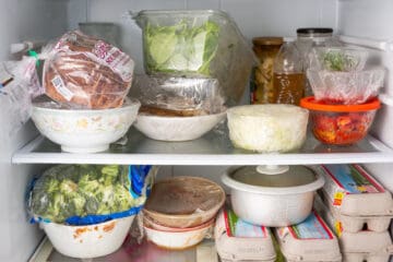 A fully stocked (but somewhat messy) refrigerator.