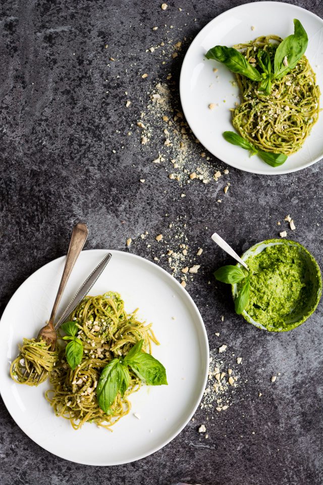 This simple recipe for oil free pesto is totally vegan, and features basil, cashew nuts and avocado. It's a super simple, staple dinner that's whipped up in no time!