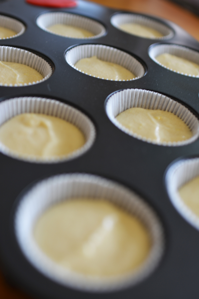 close up image of a cupcake baking tray with raw batter ready to bake