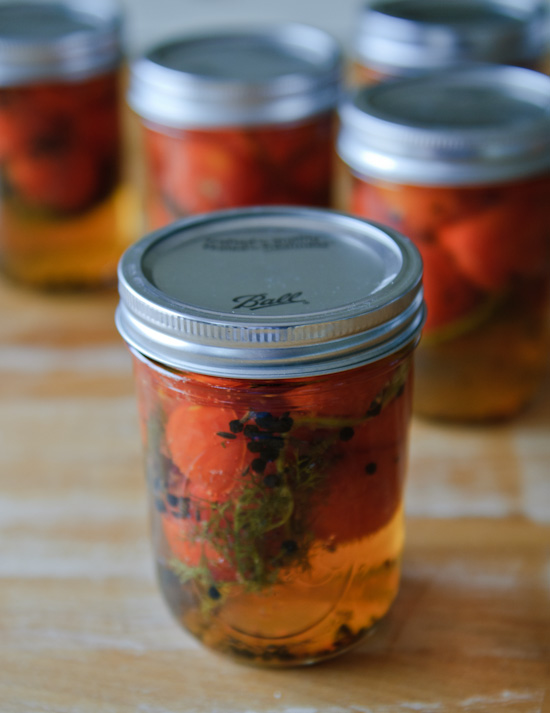 pickled cherry tomatoes in a ball jar