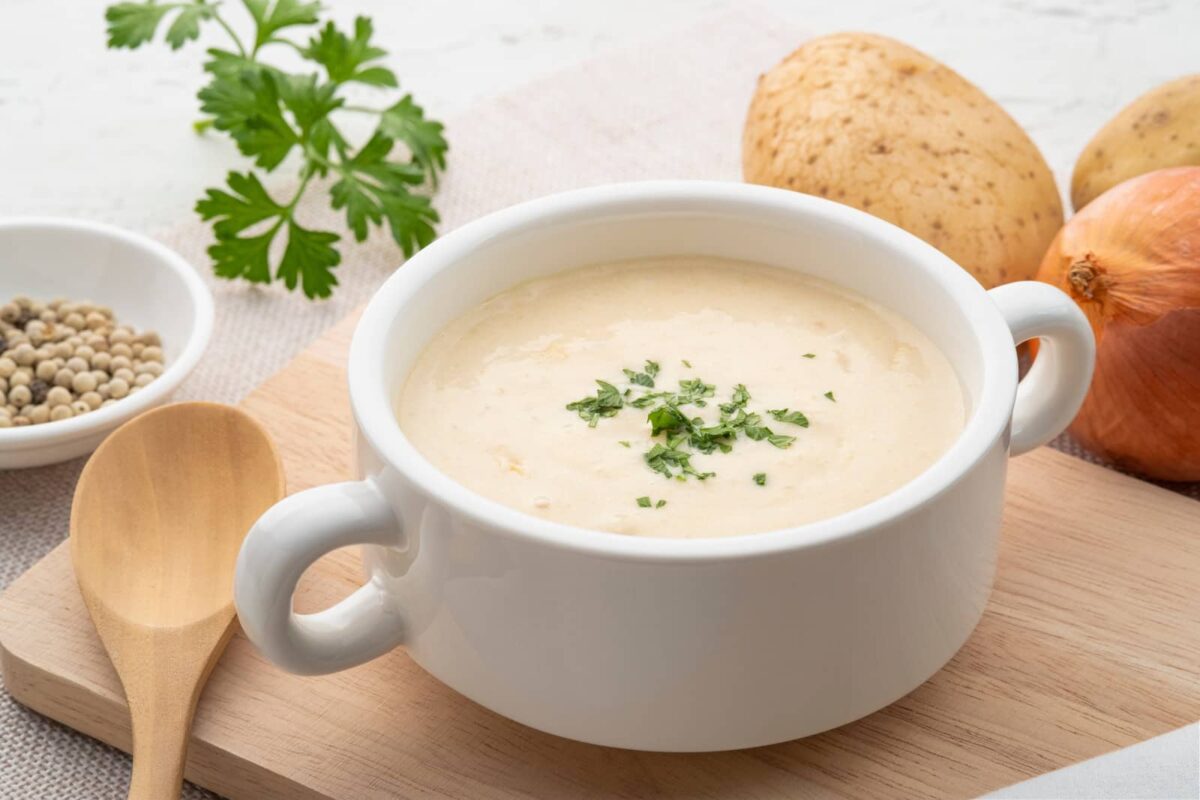 Creamy potato soup garnished with parsley