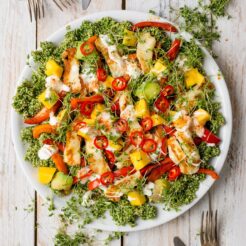 top view image of a plate full of halloumi and quinoa salad