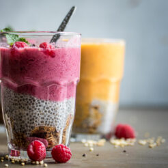 Cinnamon Rawnola layered with chia pudding and berry smoothie!