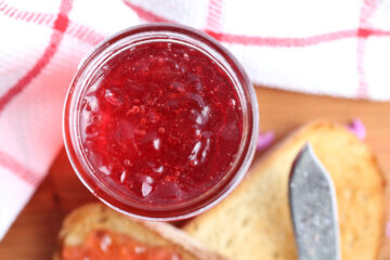 Top view of redbud jelly in a jar.