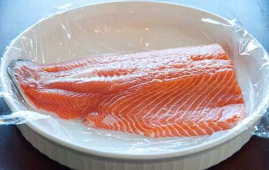 Wild caught salmon in plastic wrap.