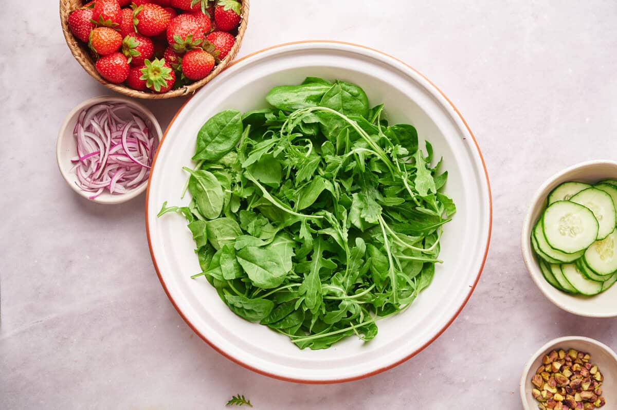 A bowl of salad greens.