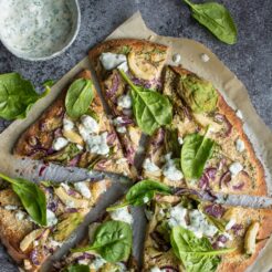 Vegan ranch pizza. This wholewheat base is topped with the creamiest vegan ranch sauce and topped with lots of great vegetables for a fun alternative to the regular tomato base.