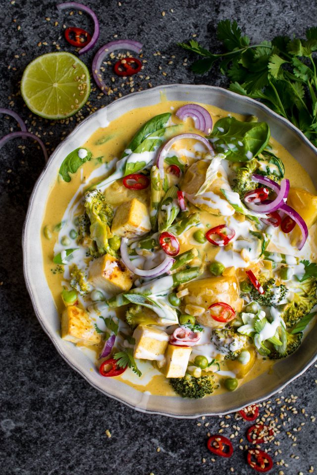 This creamy Vegan Red Thai Coconut curry is full of delicious veggies and covered with a thick, coconut sauce