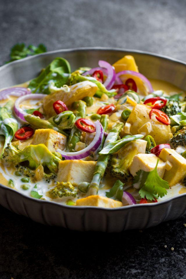 This creamy Vegan Red Thai Coconut curry is full of delicious veggies and covered with a thick, coconut sauce