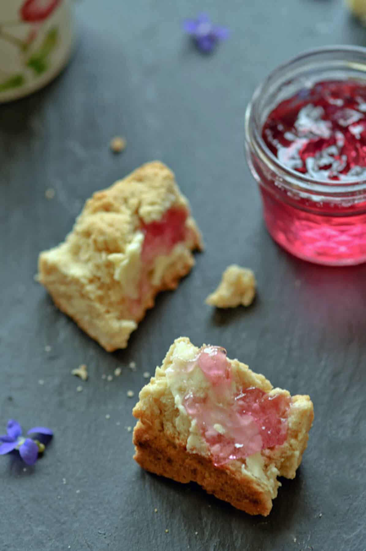 Violet jelly on a biscuit.